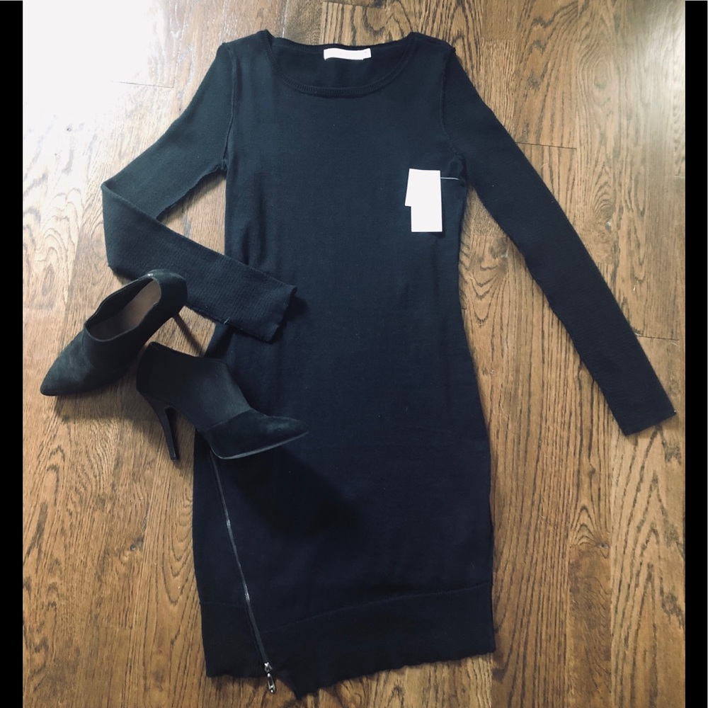 Sexy black knit dress with zipper detail on bottom